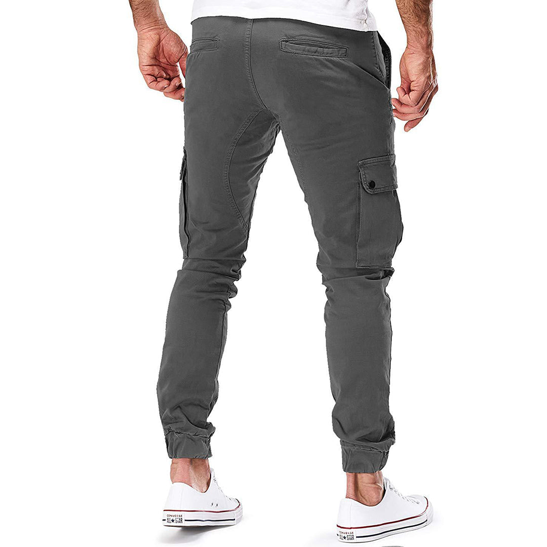 Grijze heren cargobroek met zakken, elastische boorden en casual pasvorm. Ideaal voor dagelijks gebruik. Comfortabele en trendy mannenmode.