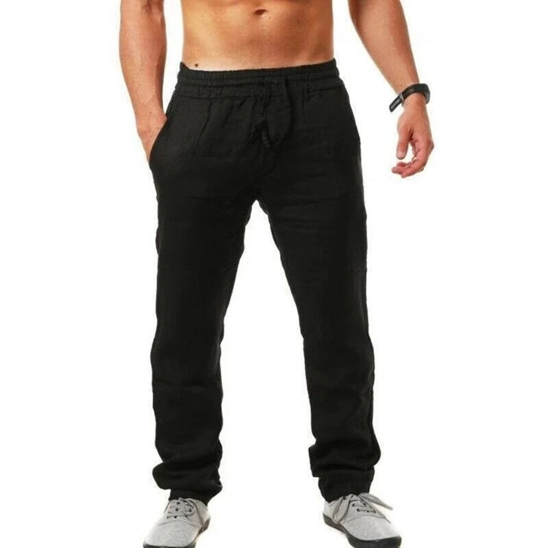 Zwarte herenlinnenbroek, zomermode, casual pasvorm, elastische tailleband, comfortabele stof, ideaal voor warme dagen, stijlvolle herenkleding.